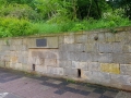 Mauer aus Steinen der Landauer Synagoge